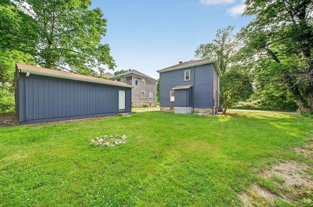 51 Ryder St, Dartmouth, MA 02747 - view of green lawn featuring an outdoor structure