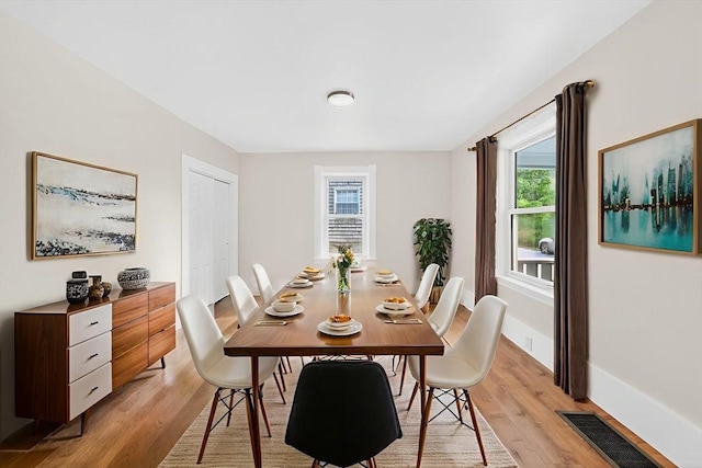 51 Ryder St, Dartmouth, MA 02747 - dining room with light wood finished floors and baseboards