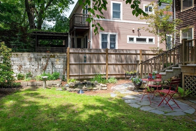 24 Foster St, Cambridge, MA 02138 - view of yard with a balcony and a patio area
