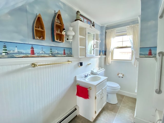 bathroom with vanity, toilet, and a baseboard radiator