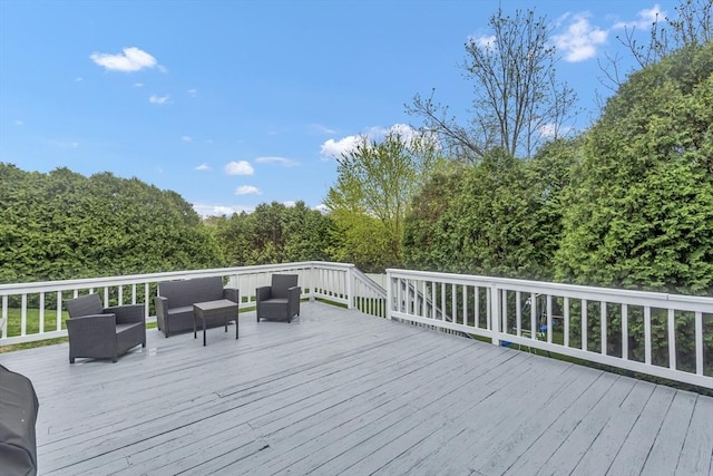 deck with an outdoor living space