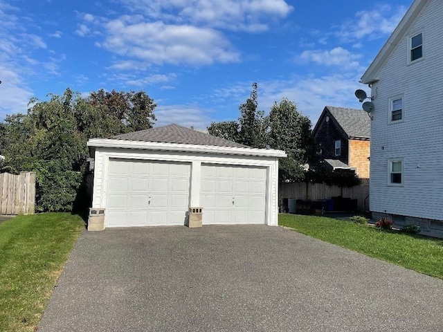 garage with a lawn