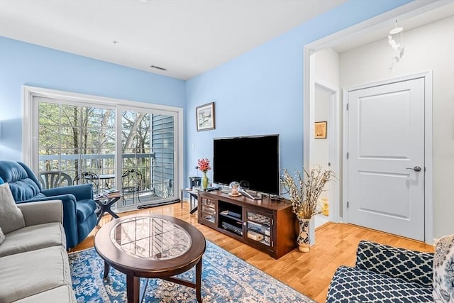 living room with hardwood / wood-style floors