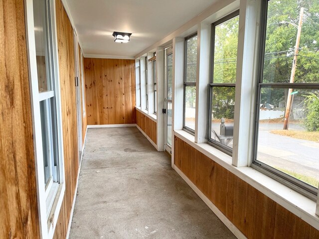 unfurnished sunroom with a healthy amount of sunlight