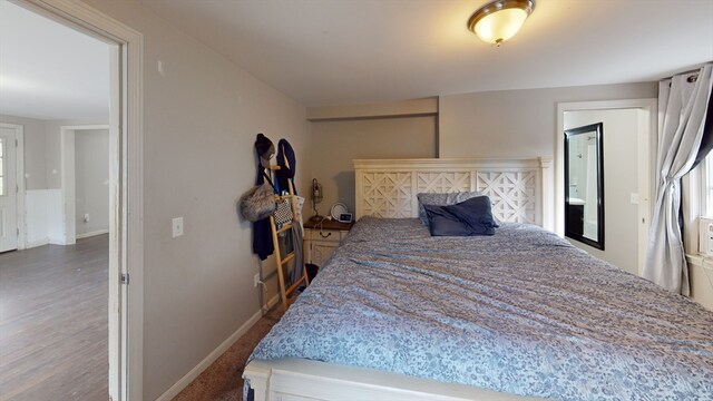 bedroom featuring hardwood / wood-style flooring