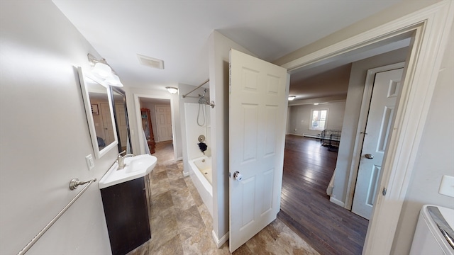 bathroom with wood-type flooring, vanity, and curtained shower