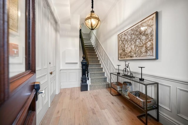 foyer entrance featuring light wood-type flooring