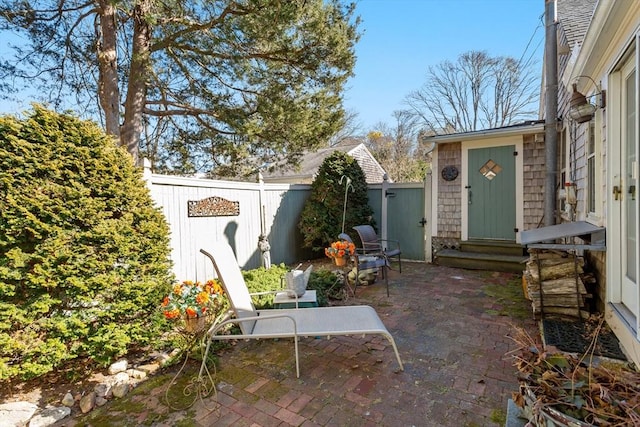 view of patio / terrace with entry steps and a fenced backyard