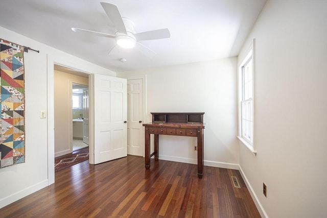 unfurnished bedroom with wood finished floors, baseboards, and ceiling fan