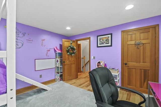 office area featuring light colored carpet