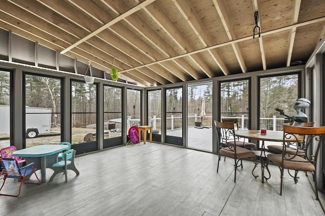 sunroom / solarium with lofted ceiling