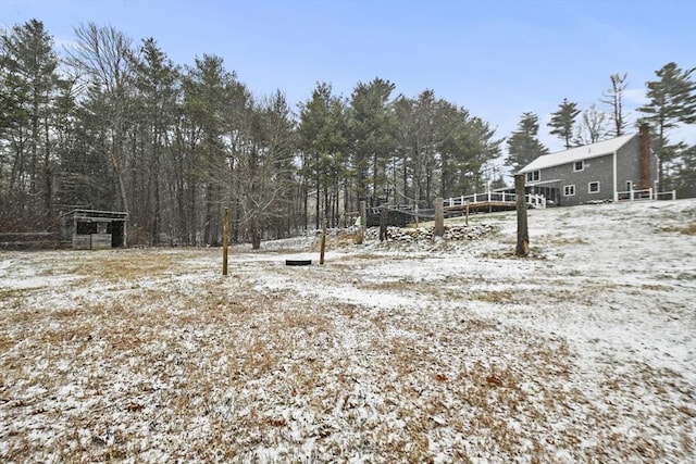 view of yard covered in snow