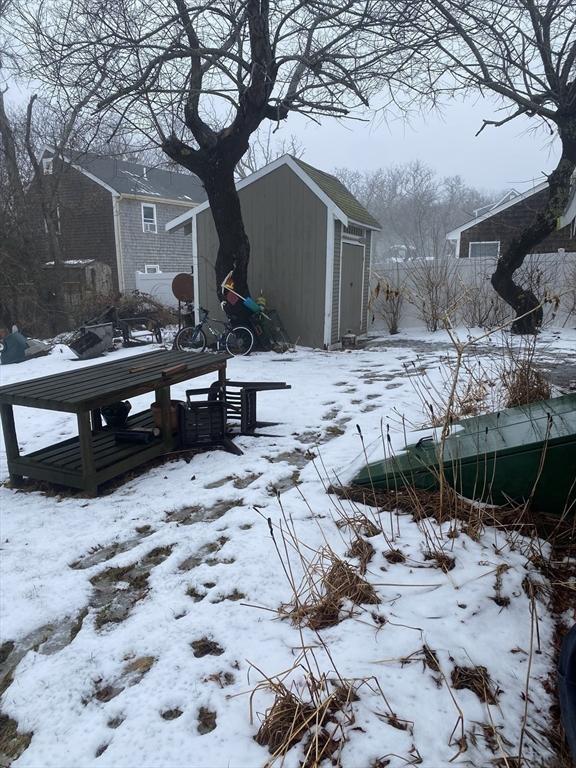 40 Provincetown View Rd, Plymouth, MA 02360 - snowy yard with a shed