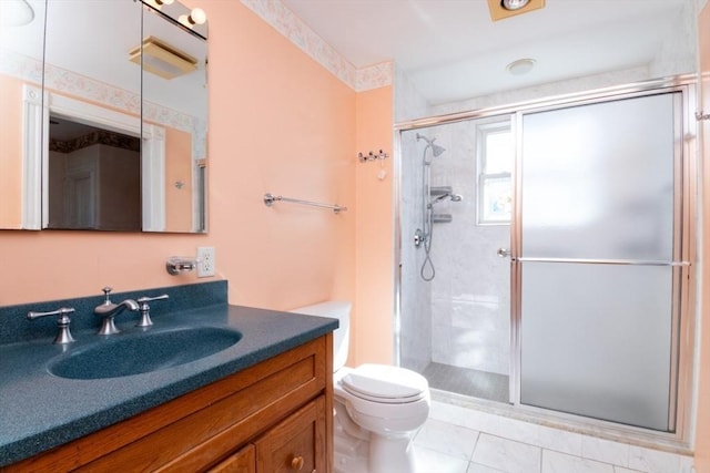 full bathroom with tile patterned floors, a stall shower, toilet, and vanity