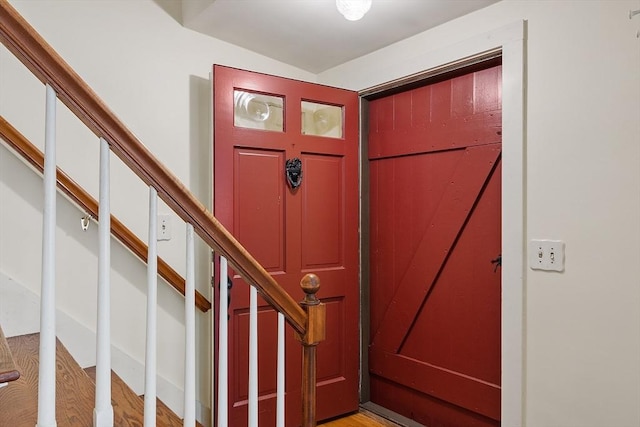 foyer with stairway and light wood-type flooring