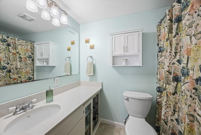 bathroom with tile patterned floors, visible vents, toilet, baseboards, and vanity