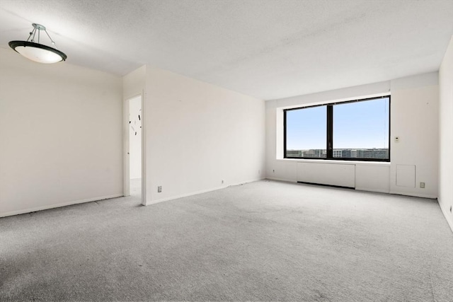 85 E India Row Unit 31D, Boston, MA 02110 - carpeted empty room with baseboards
