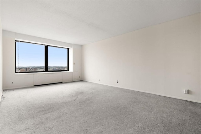 85 E India Row Unit 31D, Boston, MA 02110 - empty room featuring carpet floors and baseboards