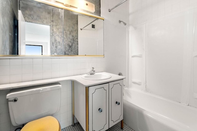 85 E India Row Unit 31D, Boston, MA 02110 - bathroom with tile walls, bathtub / shower combination, vanity, toilet, and tile patterned flooring