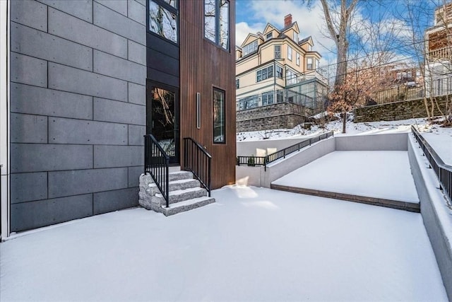 view of snow covered patio