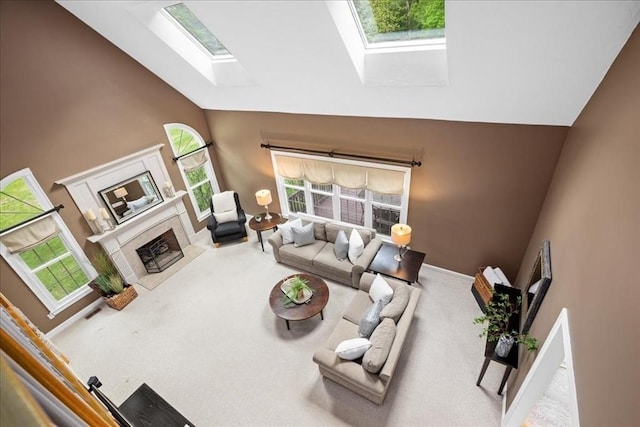 17 Fiddleneck Ln, Southborough, MA 01772 - living area featuring a skylight, high vaulted ceiling, and carpet flooring