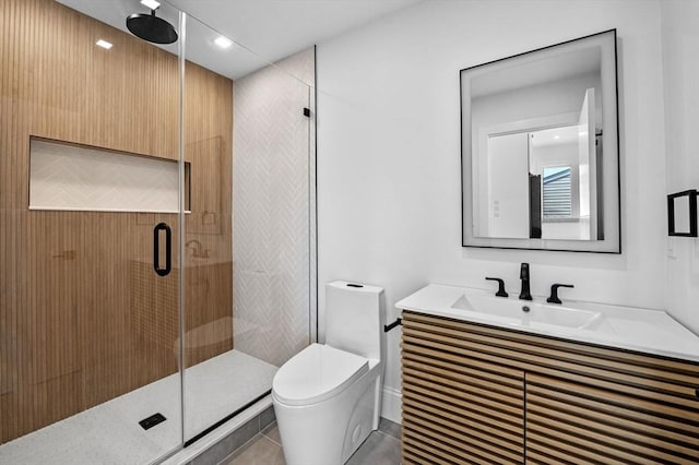 304 Paris St Unit 2, Boston, MA 02128 - bathroom featuring vanity, a stall shower, toilet, and tile patterned floors