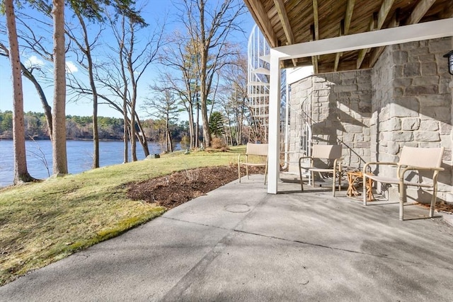 view of patio / terrace with a water view