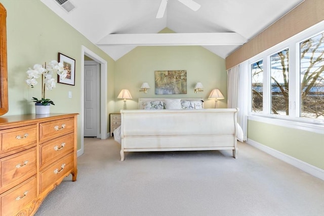 carpeted bedroom featuring ceiling fan and vaulted ceiling