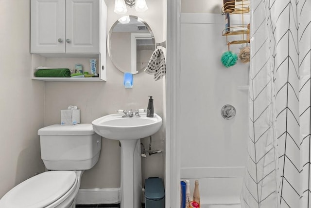 314 W 4th Unit 1, Boston, MA 02127 - bathroom featuring toilet and a shower with shower curtain