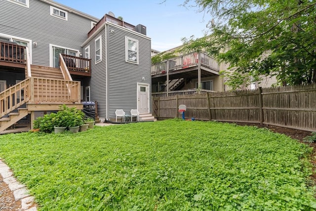 314 W 4th Unit 1, Boston, MA 02127 - back of house featuring stairs, entry steps, a chimney, and a deck