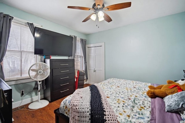 bedroom featuring ceiling fan and hardwood / wood-style floors