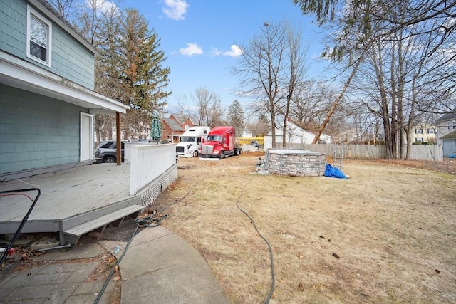 view of yard featuring a wooden deck