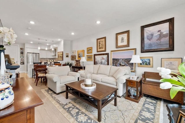130 Broad Reach Unit 302, Weymouth, MA 02191 - living room with recessed lighting and light wood-style flooring