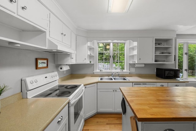 12 Wildwood Ter, Mattapoisett, MA 02739 - kitchen with open shelves, white appliances, wood counters, and white cabinetry