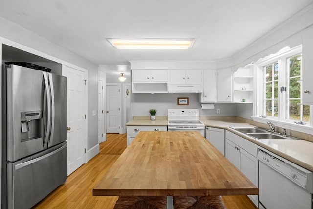 12 Wildwood Ter, Mattapoisett, MA 02739 - kitchen featuring white appliances, open shelves, light wood-style flooring, white cabinets, and under cabinet range hood