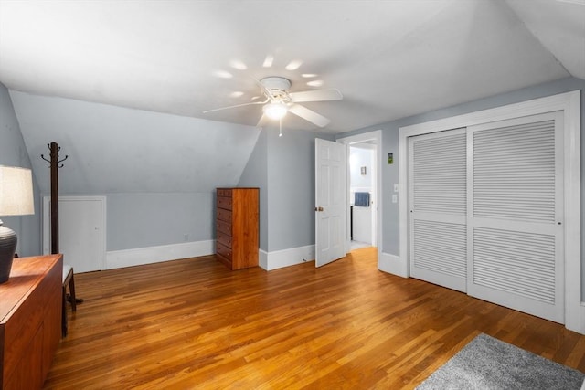 12 Wildwood Ter, Mattapoisett, MA 02739 - unfurnished bedroom featuring light wood-style floors, vaulted ceiling, a closet, and ceiling fan
