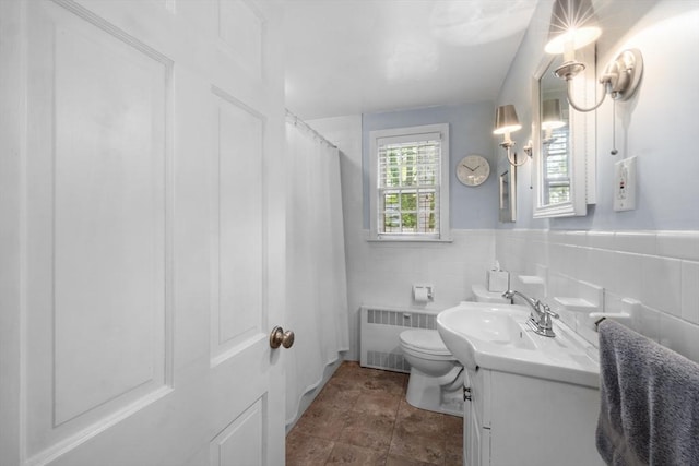12 Wildwood Ter, Mattapoisett, MA 02739 - full bath with radiator, vanity, curtained shower, tile walls, and wainscoting