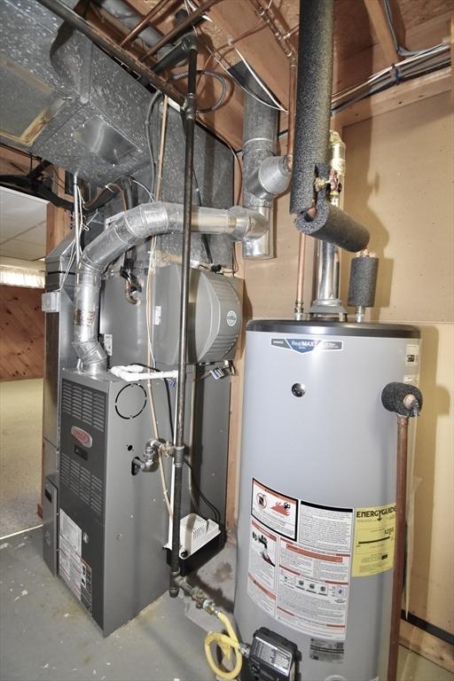 utilities with heating unit and gas water heater