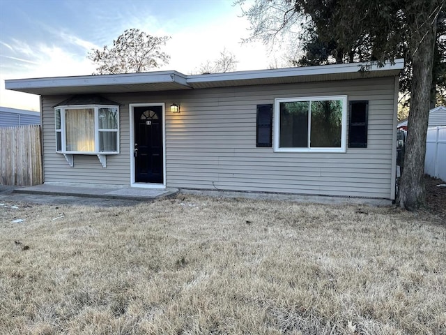 view of front of home with a front yard