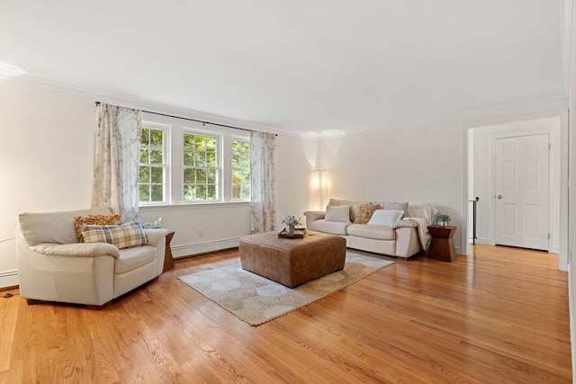 45 Fairfield St, Maynard, MA 01754 - living room with baseboard heating, ornamental molding, light wood finished floors, and baseboards