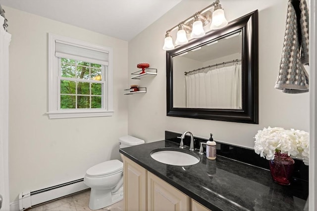 45 Fairfield St, Maynard, MA 01754 - full bath with a baseboard heating unit, vanity, and toilet