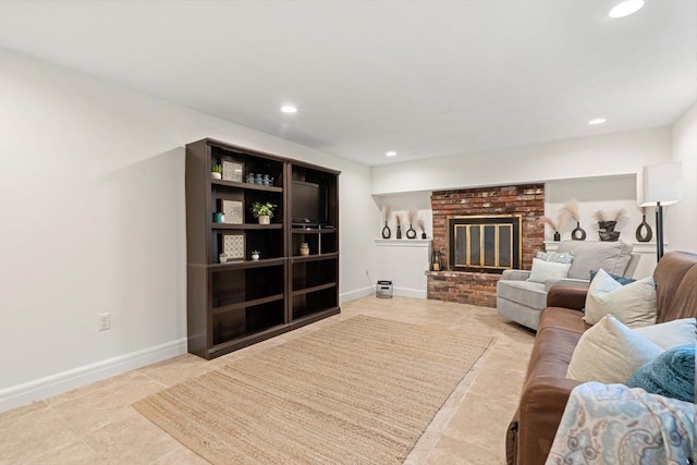 45 Fairfield St, Maynard, MA 01754 - living area with recessed lighting, baseboards, a fireplace, and light tile patterned floors