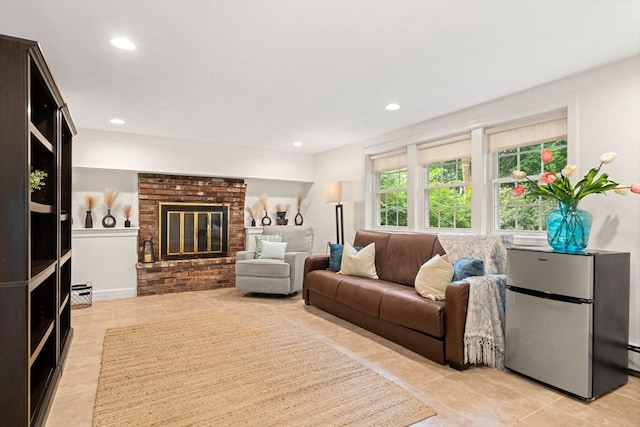 45 Fairfield St, Maynard, MA 01754 - living area featuring light tile patterned floors, a brick fireplace, and recessed lighting