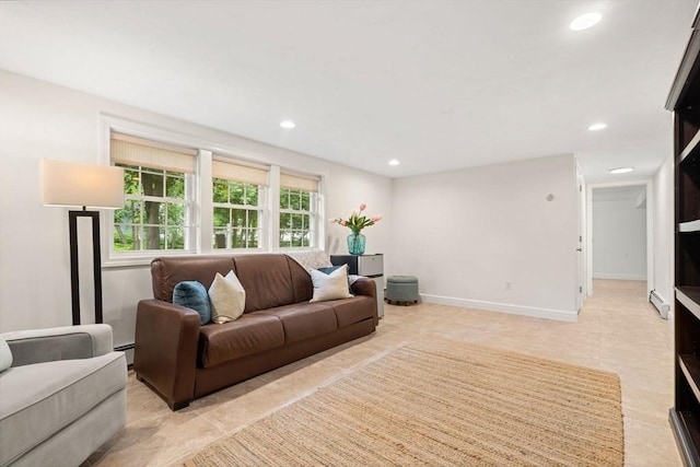 45 Fairfield St, Maynard, MA 01754 - living area with recessed lighting, a baseboard radiator, and light tile patterned floors