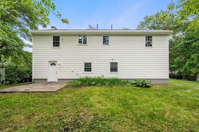 45 Fairfield St, Maynard, MA 01754 - back of property with a yard and a patio area
