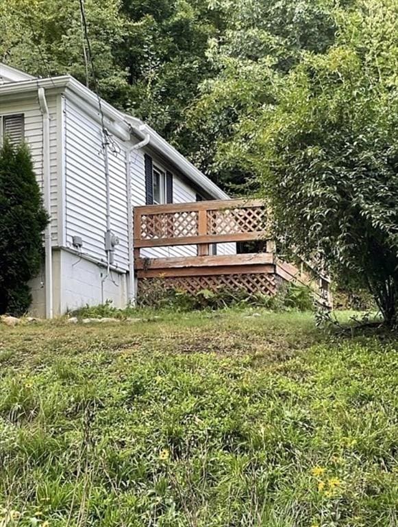 view of yard featuring a deck