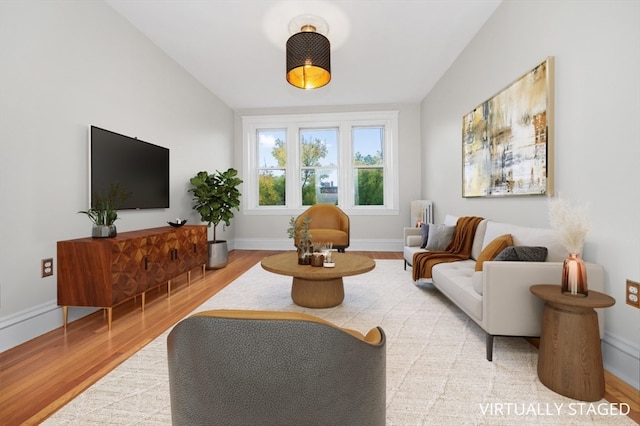 living room with light hardwood / wood-style floors