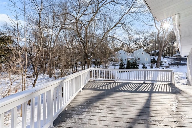 view of snow covered deck