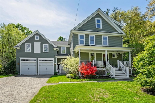 18 Hill St, Lexington, MA 02421 - view of front facade with covered porch, decorative driveway, an attached garage, and a front lawn