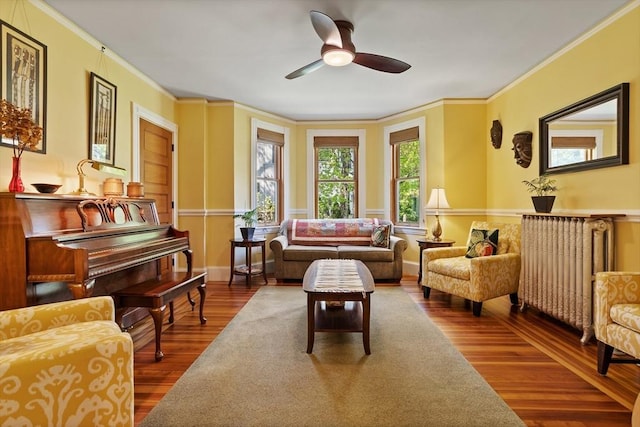 18 Hill St, Lexington, MA 02421 - living area with wood finished floors, ceiling fan, ornamental molding, and baseboards